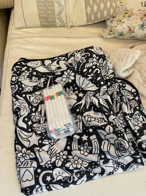 Coloriva Decke auf dem Sofa